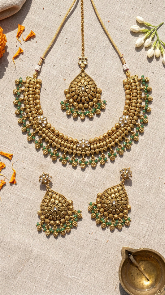 Manjusha gold look necklace set with matching earrings for women