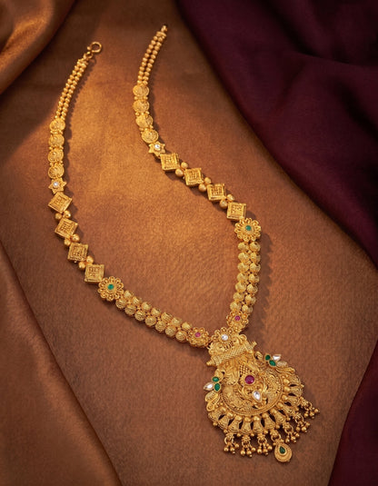 Ethnic imitation long necklace set with pendant in antique gold polish