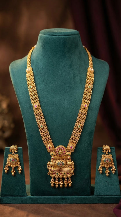 Detailed craftsmanship close up view of Navika Antique Gold look Longset