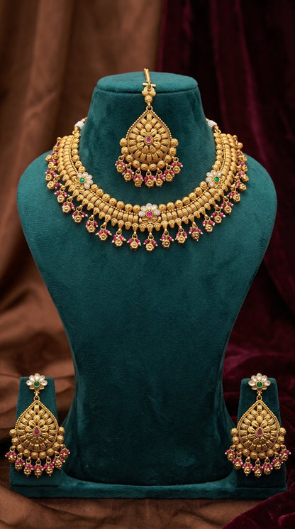 Manjusha gold look necklace set with matching earrings for women ruby