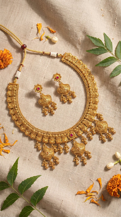 Sayani gold look necklace set with matching earrings for women